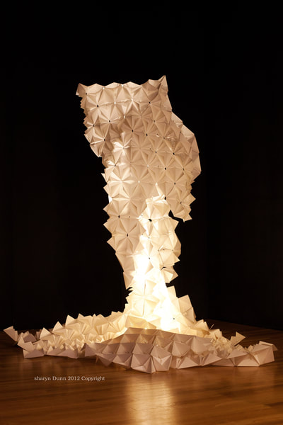 Known as "The Dress" this sculpture can be adapted and lit in different orientations showing it varied light and shadow effects.